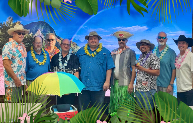 Ford AV Dallas sales team celebrating after surpassing sales quotas