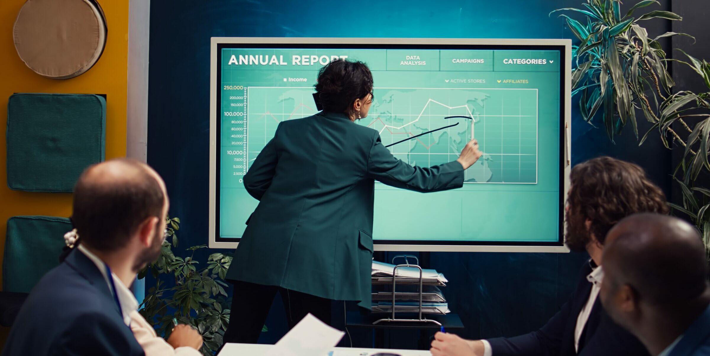 Chief executive officer reviewing business expansion opportunities with digital tools