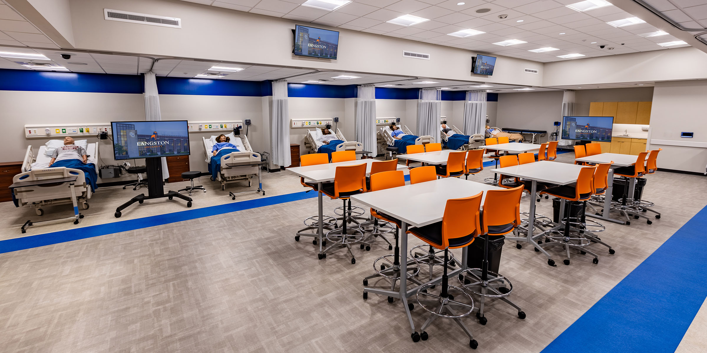 Simulation lab at Lanston University using advanced AV equipment for immersive healthcare education and training.