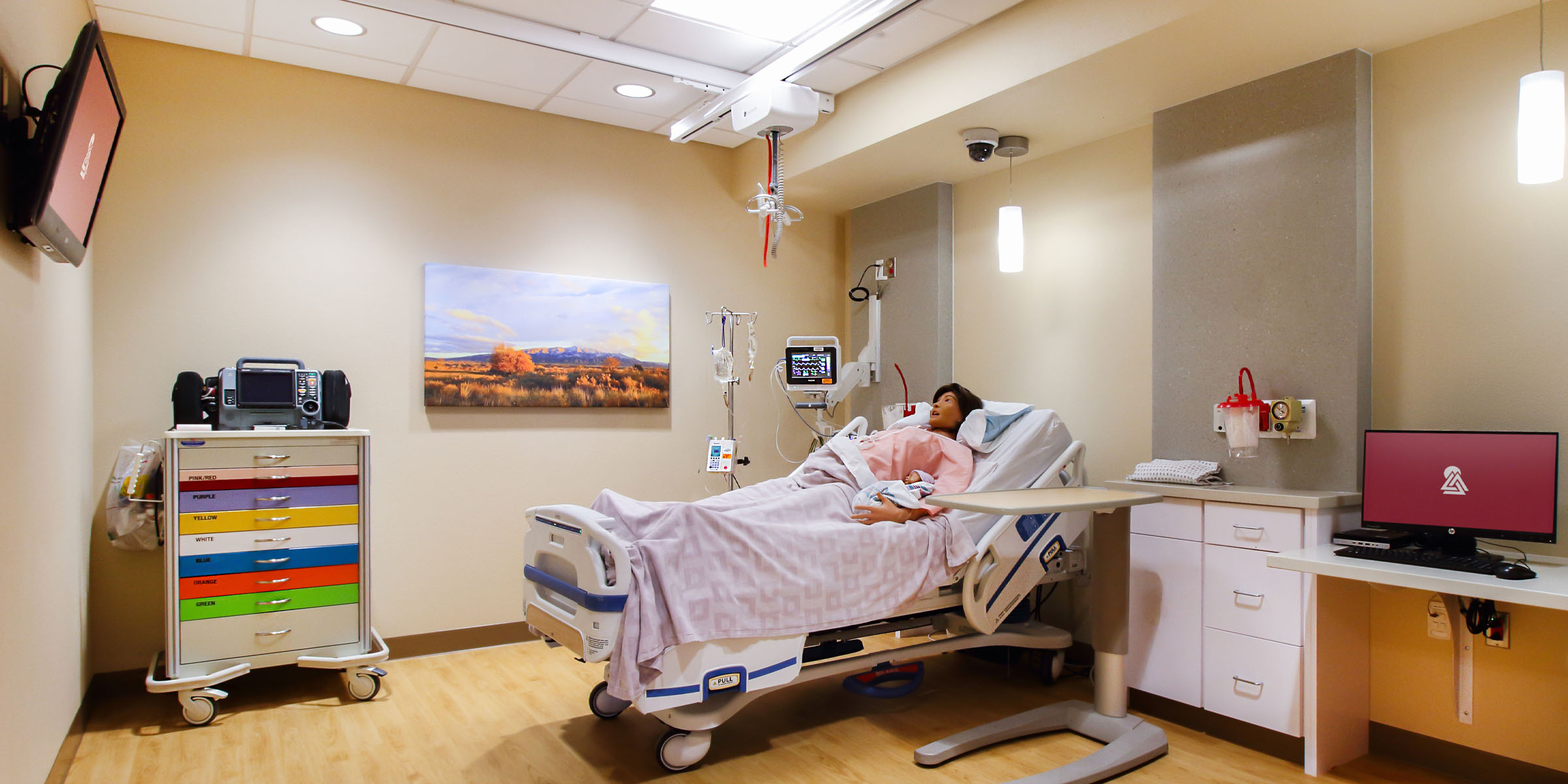 Presbyterian Albuquerque Simulation Center with high-tech audiovisual systems for medical training scenarios.