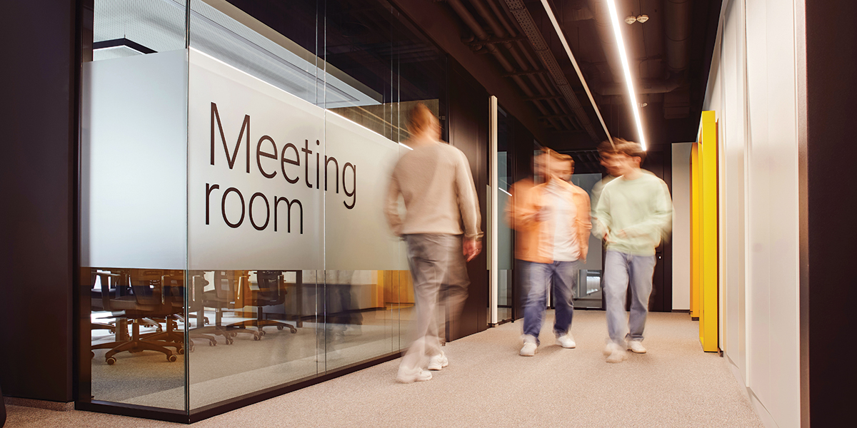 Envato corporate meeting room equipped with Ford AV conferencing technology and video display solutions