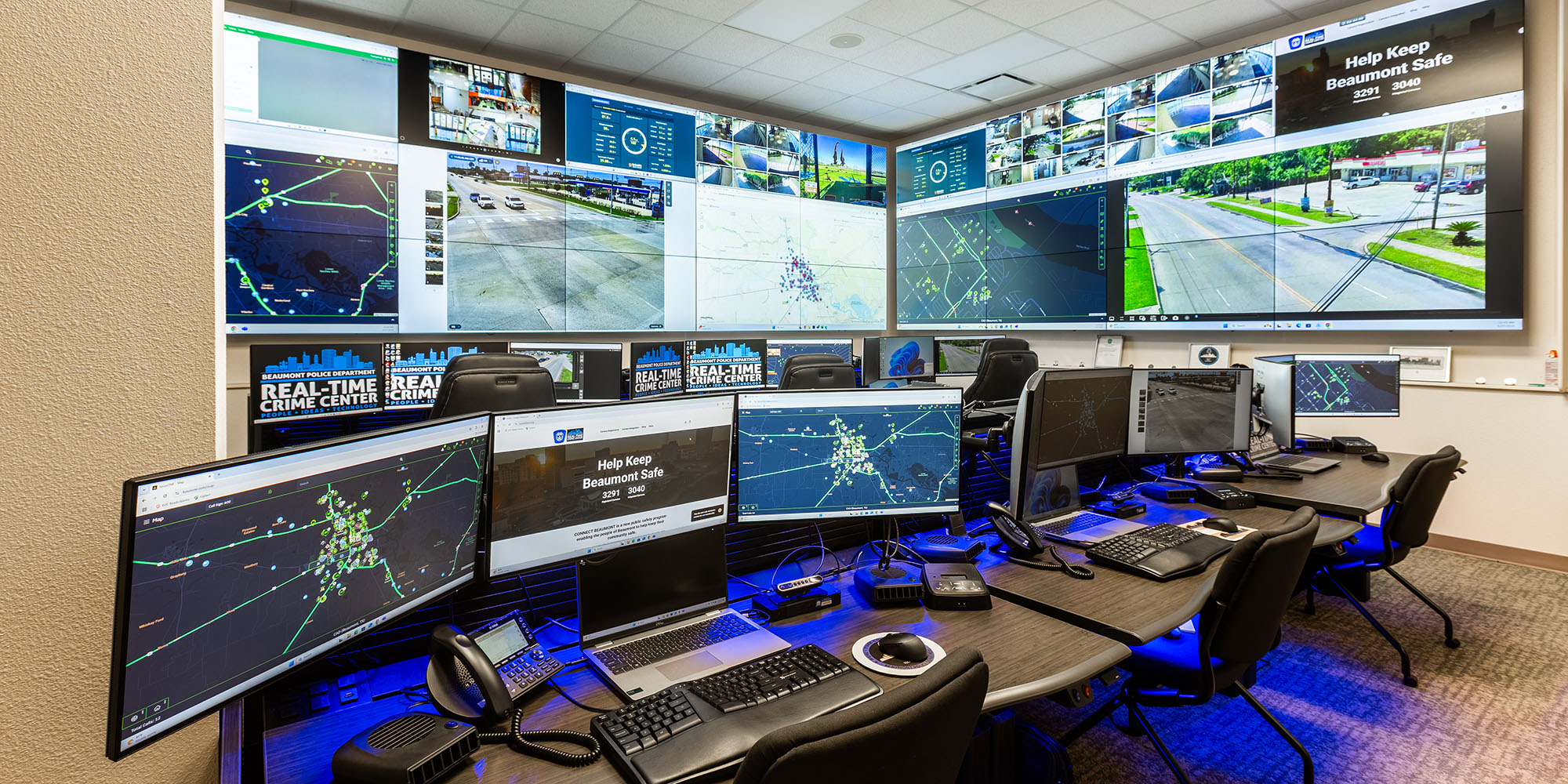 Real-time crime center video wall displaying live camera feeds and public safety data